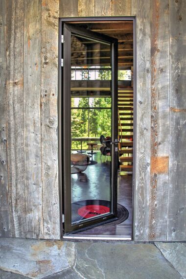 ConceptSystem 77 Okna aluminiowe, ConceptSystem 77 Drzwi aluminiowe, HiFinity Drzwi przesuwne aluminiowe oraz Purity Klamki aluminiowe - Rezydencja Flying Star zlokalizowany w Bridger Canyon, Stany Zjednoczone Ameryki Północnej