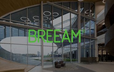 BREEAM logo in front of glass façade.